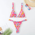 Women's printed floral bikini swimsuit in polyester available in multiple colours including rose red, blue, white, and sky blue