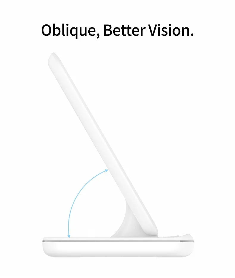 White three-in-one wireless charging stand for mobile phone, smartwatch, and headset on a desk.