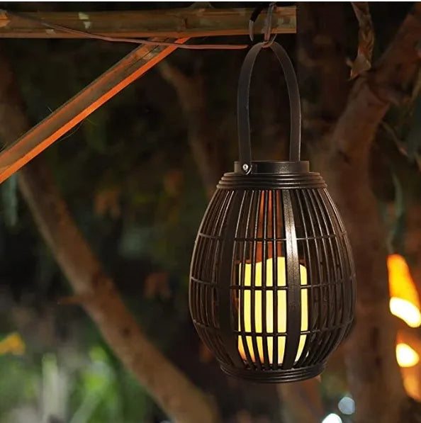 Retro oval rattan solar garden light for patio illumination with plastic construction
