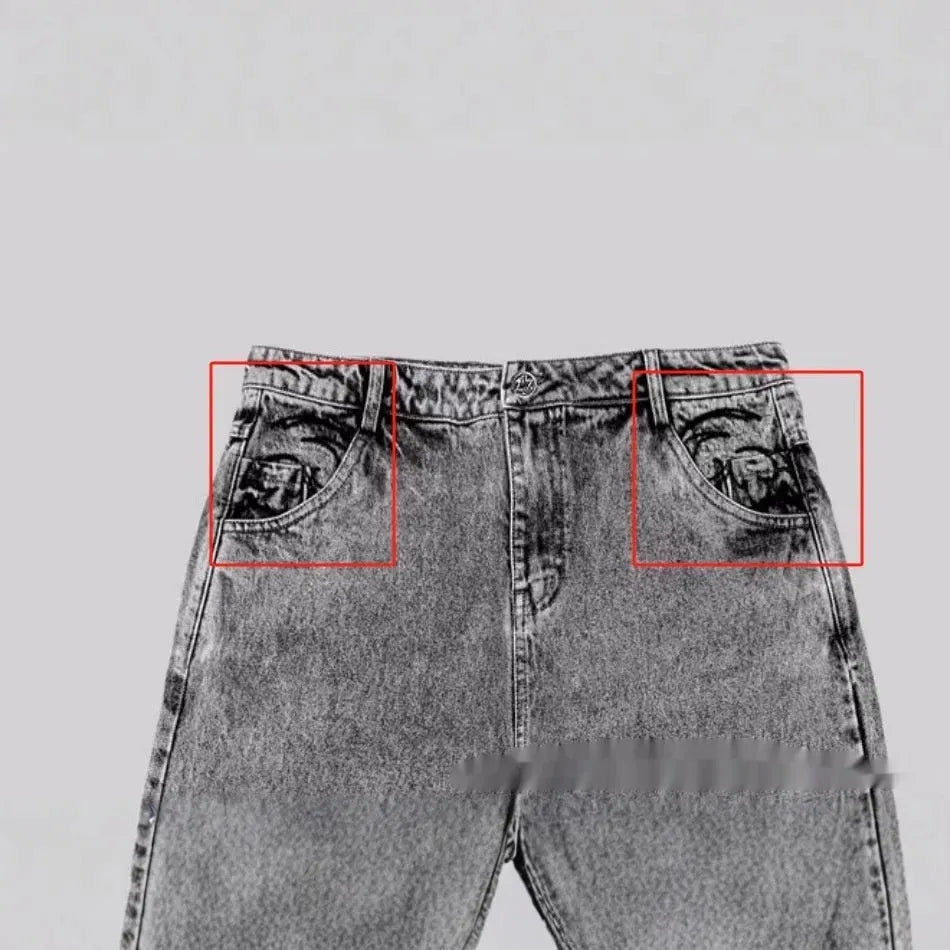 Grey loose fit straight-leg denim trousers on a mid-waist hanger