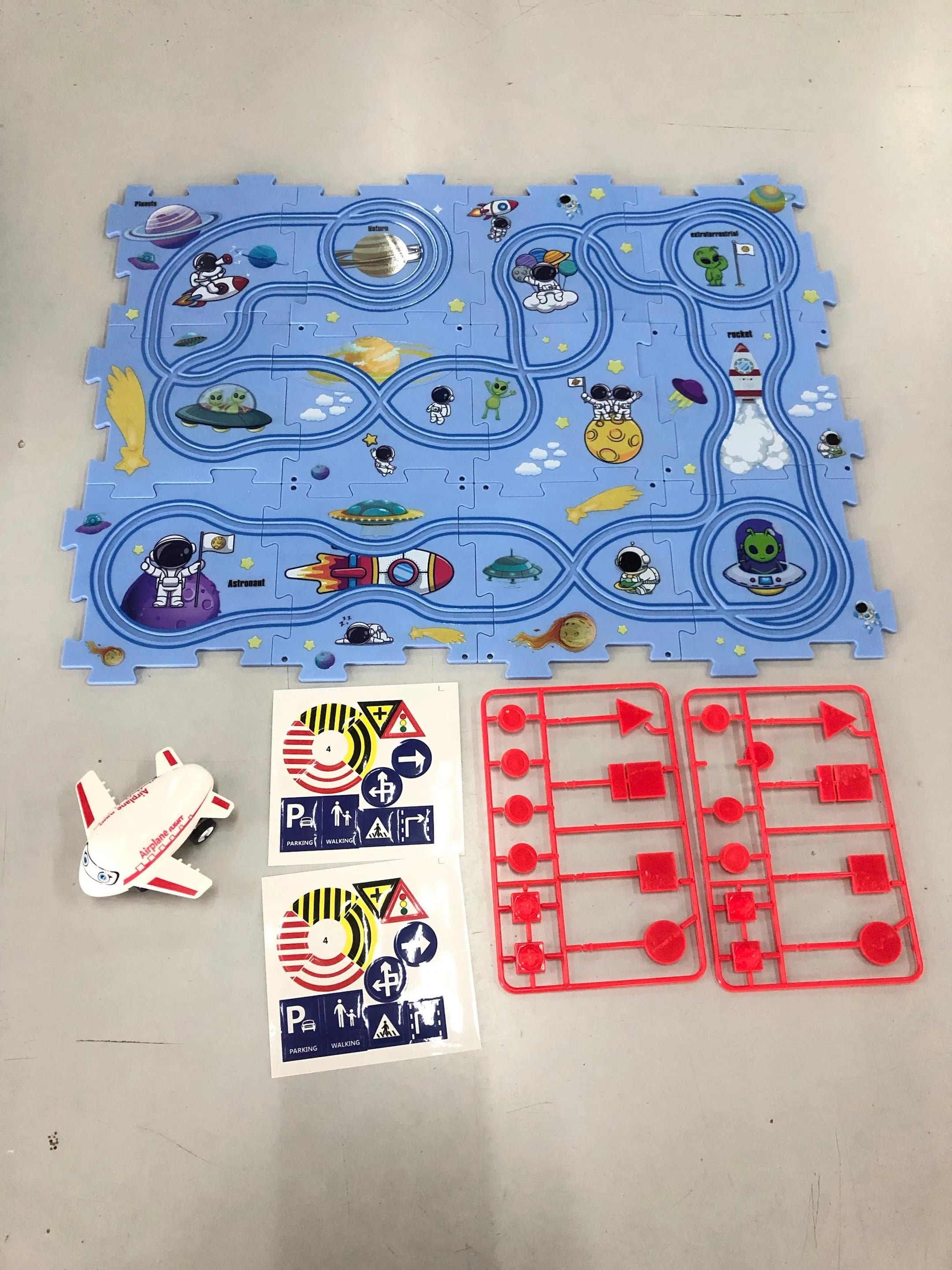 Children puzzle electric railroad speeder DIY assembly track set with automatic car and plastic pieces in multiple themes