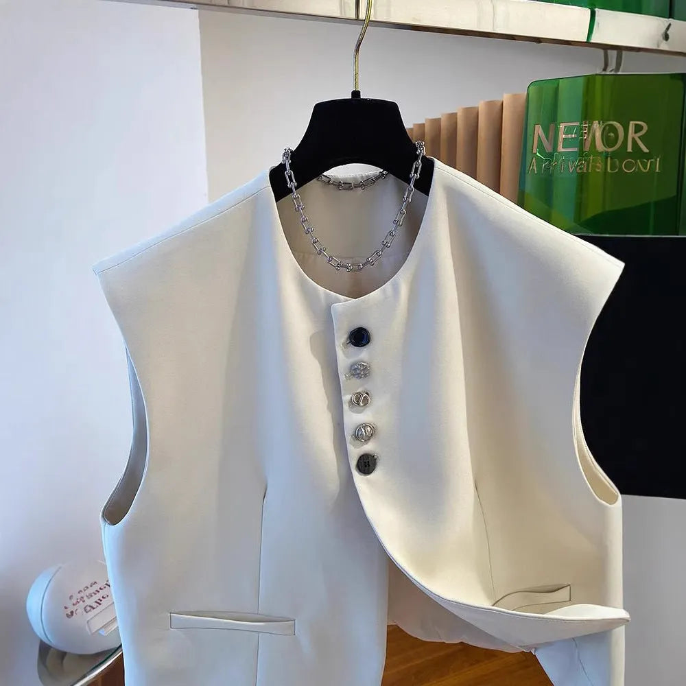 Loose-fitting beige waistcoat dress with bandage style, pockets, and a short 40cm length on a hanger.