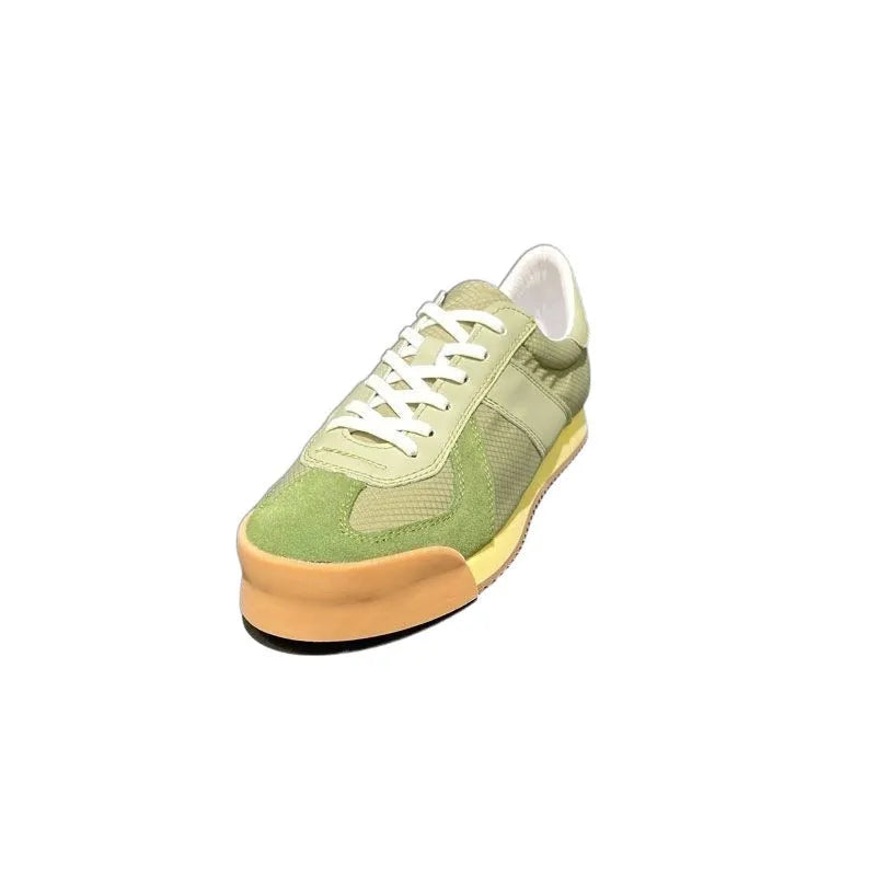 Men's grey suede and mesh sports shoe with a raised heel and herringbone pattern on the toe.