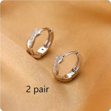 Geometric copper interwoven earrings with hemp rope design in gold or silver finish.