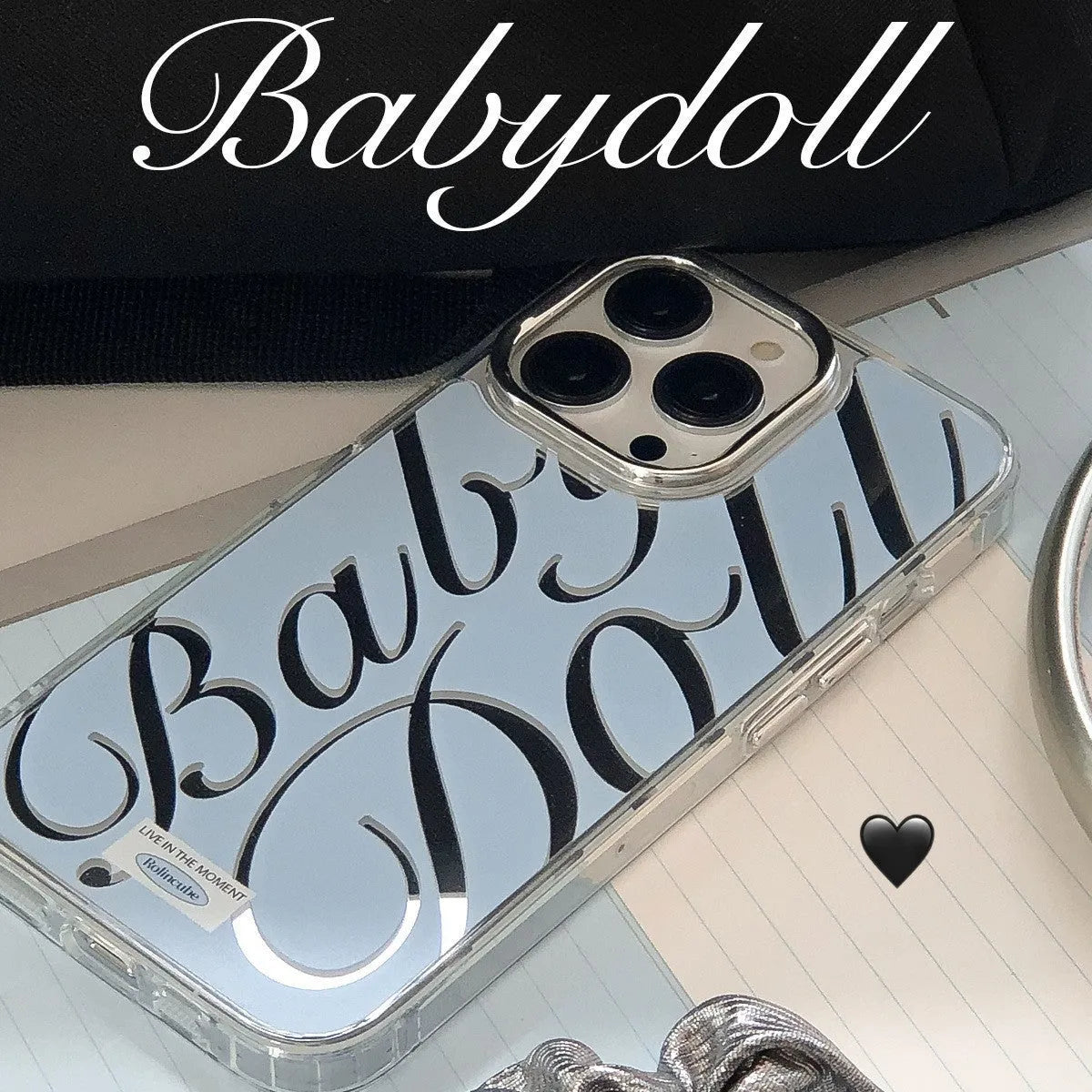 Transparent blue mirror iPhone case with JMKJ English letters showing frosted finish