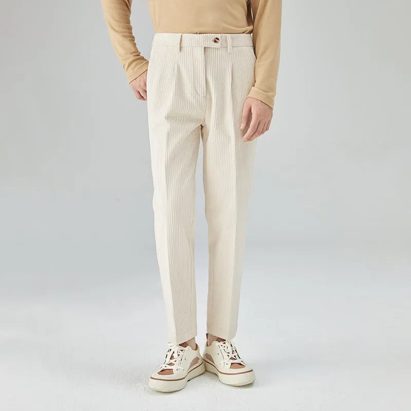Men's straight-leg corduroy trousers in beige colour showing mid-waist design and loose fit