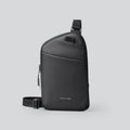 Men's black Oxford cloth crossbody bag showing sewing thread details and simple design