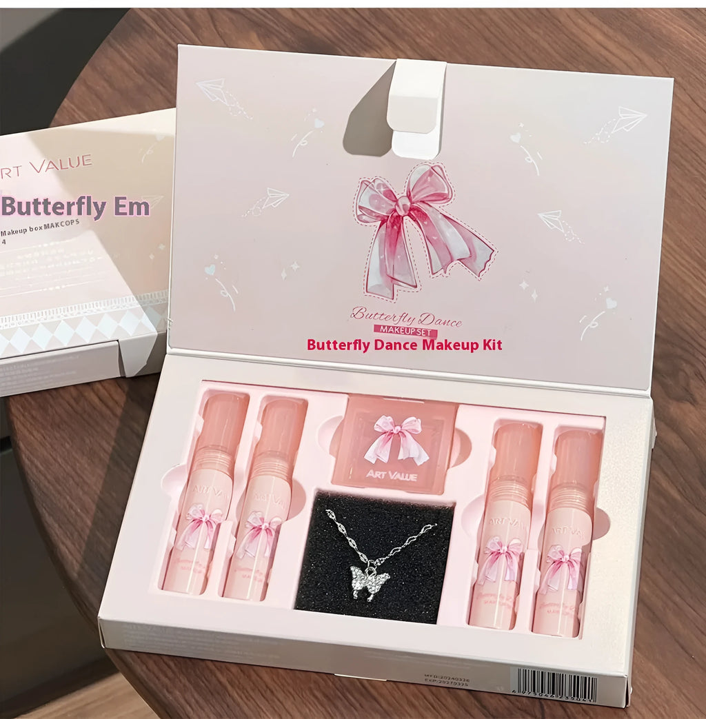 Butterfly Box makeup set showing four matte lip mud tubes, powder blusher compact, and necklace accessory