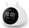 Silicone smart alarm clock with voice control and human body induction, shown in a white deer style.