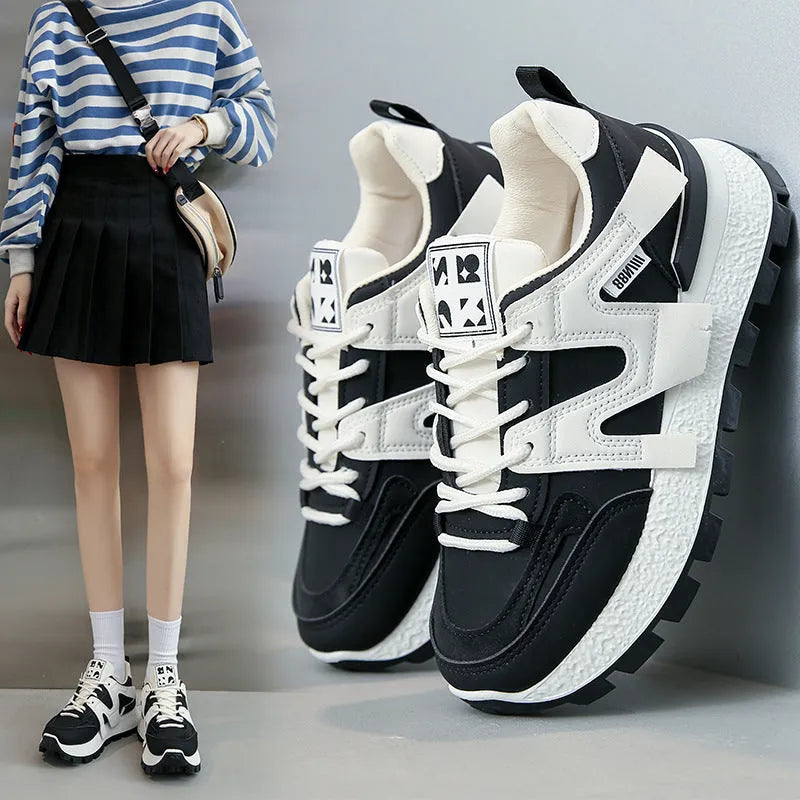 Women's low-top sneakers in white or black with artificial PU upper and rubber sole
