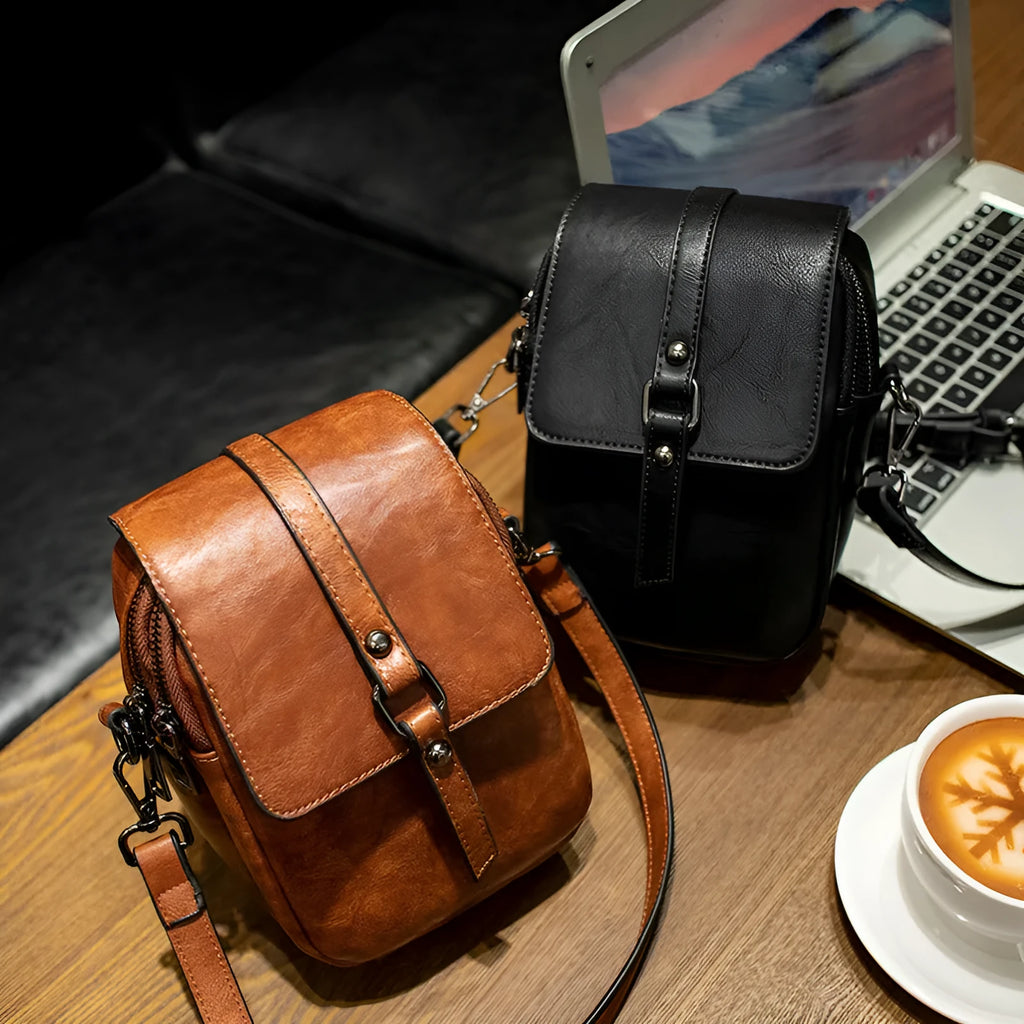 Women's retro crossbody phone bag in brown PU with square clamshell shape and single shoulder strap