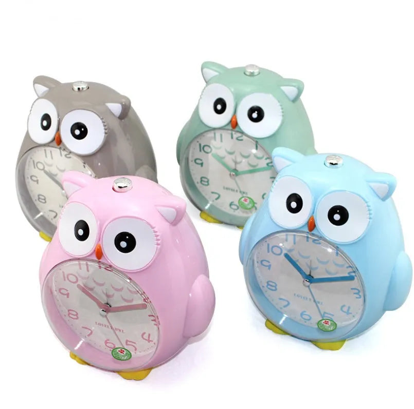 Creative children owl cartoon alarm clock in pink with silent wake-up function, plastic build, 14x11.5x17.5cm