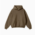 A loose grey men's cotton hooded sweater with drop-shoulder sleeves on a hanger.