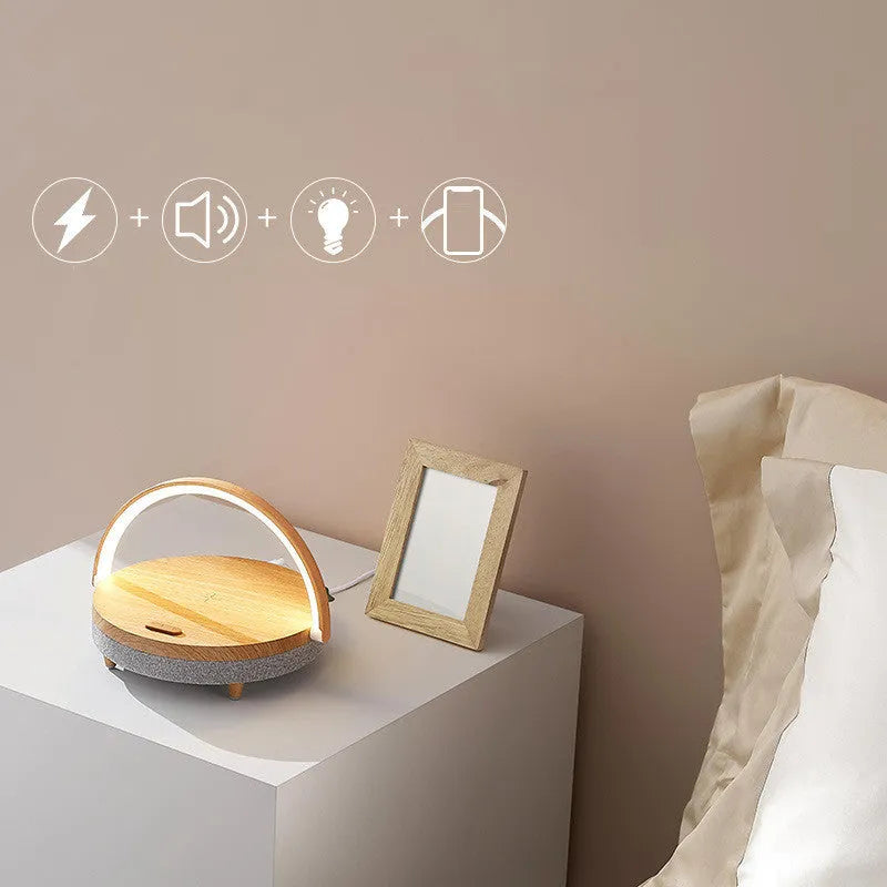 Wireless charging pad with integrated LED night light and Bluetooth speaker in marble pattern finish