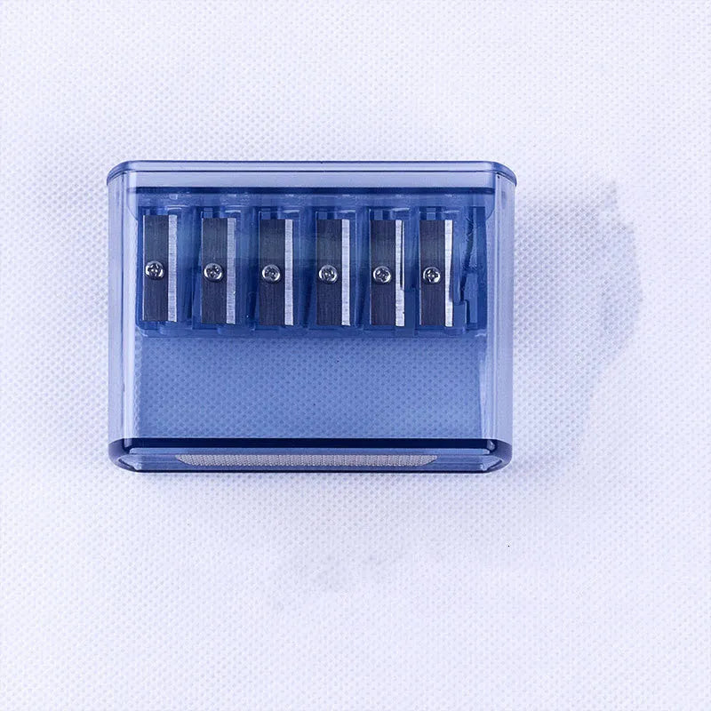 LK06 manual six-hole pencil sharpener made of white ABS plastic with a replaceable blade.