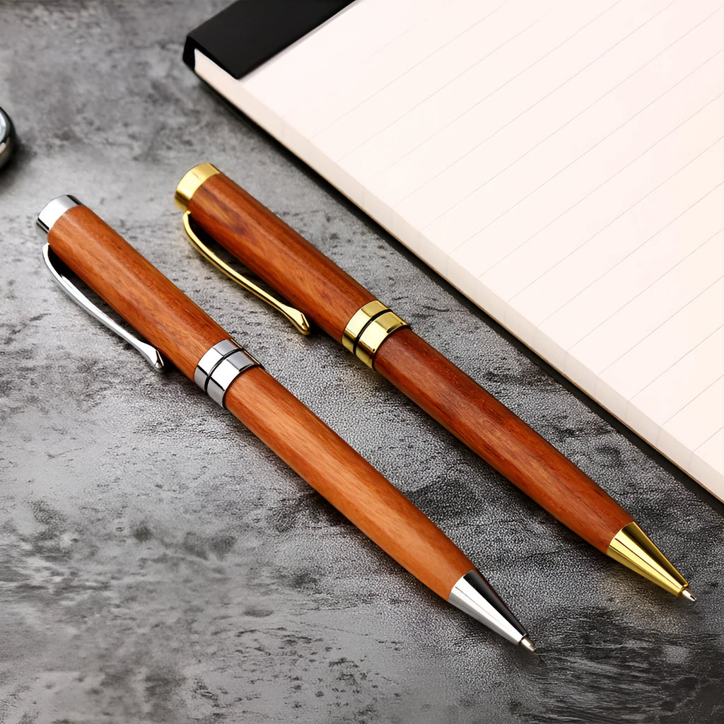 Wooden metal ballpoint pen with rosewood barrel on white background