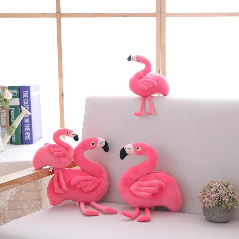 Pink flamingo plush toy with short plush fabric, filled with PP cotton, sitting on a surface