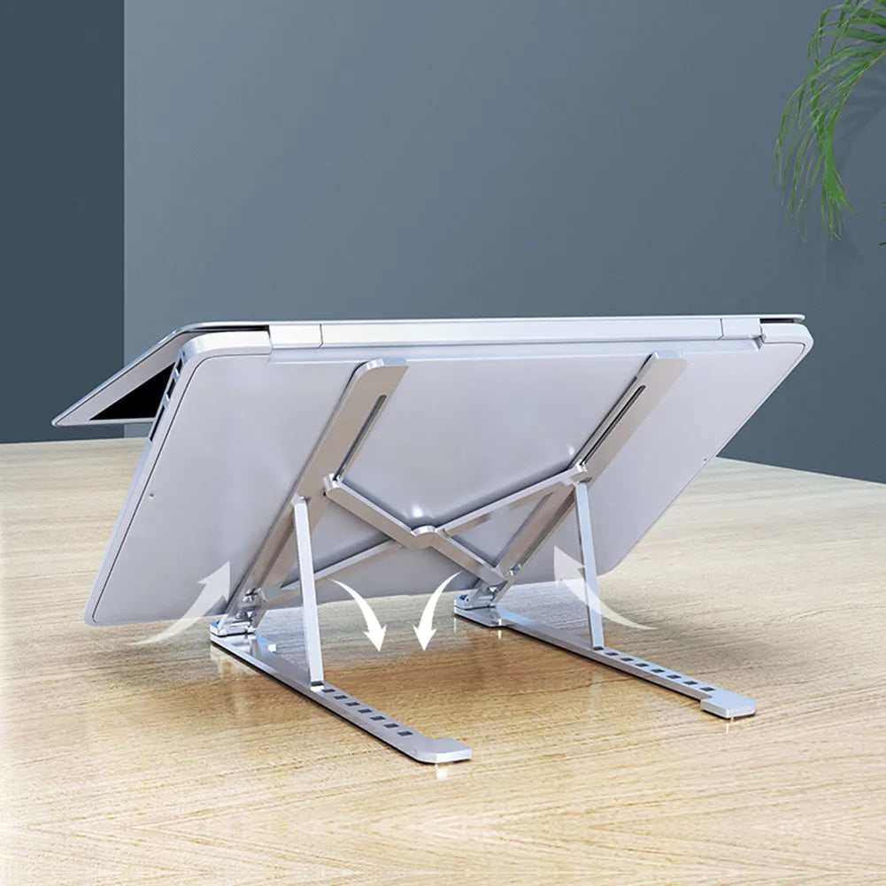 Aluminium foldable laptop stand shown in silver colour, adjusted to a mid-height position.