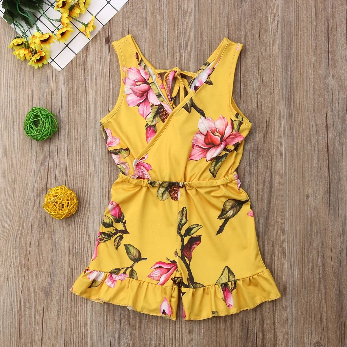 Girls' white and yellow cotton floral summer dress for toddlers and children.