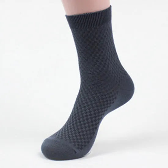 Men's bamboo fibre business socks in a small square pattern, shown in navy blue colour.