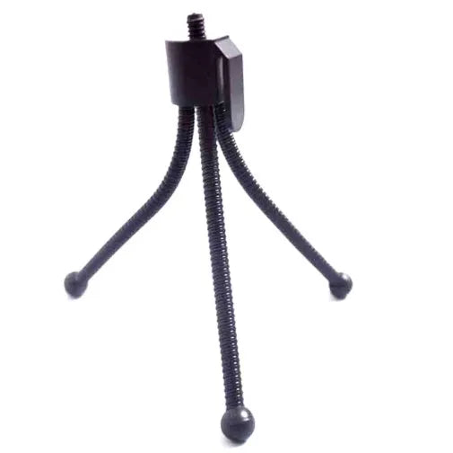Small black iron frame mini tripod with folded legs and a ball head, shown next to a smartphone.
