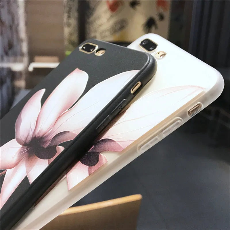 Embossed iPhone case with flower design in black TPU material showing textured back surface