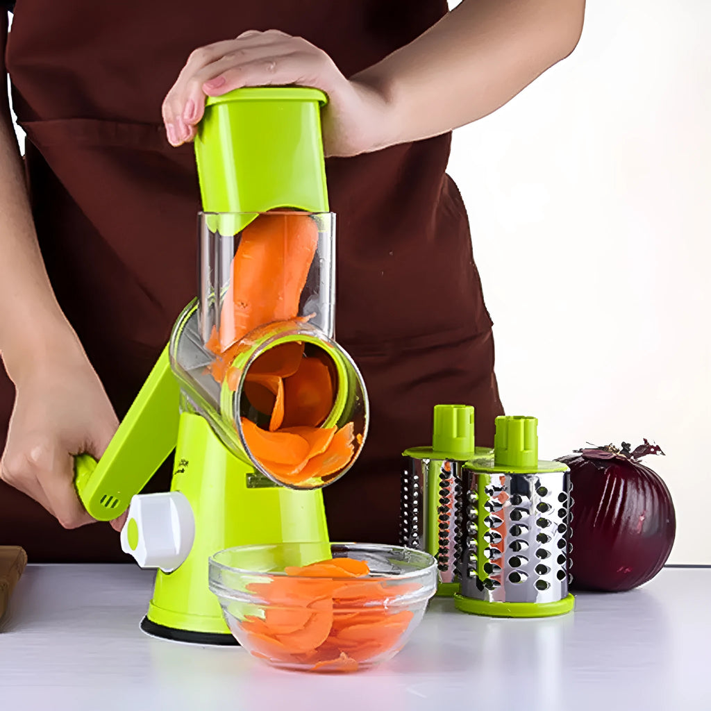 Round mandoline vegetable cutter with three stainless steel drum blades and sucker base on a worktop
