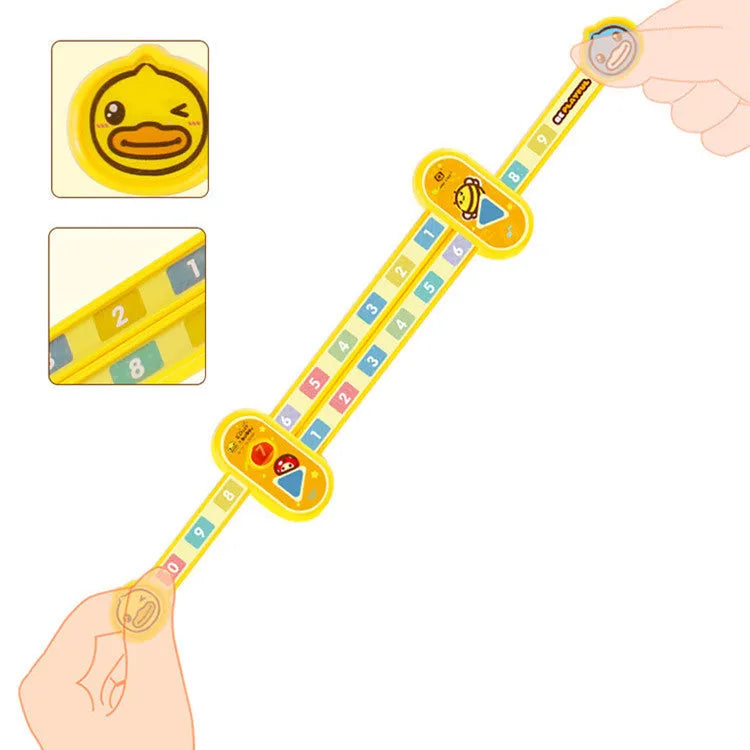 Yellow plastic children's digital resolution ruler with cartoon graphics measuring 24.5 cm long