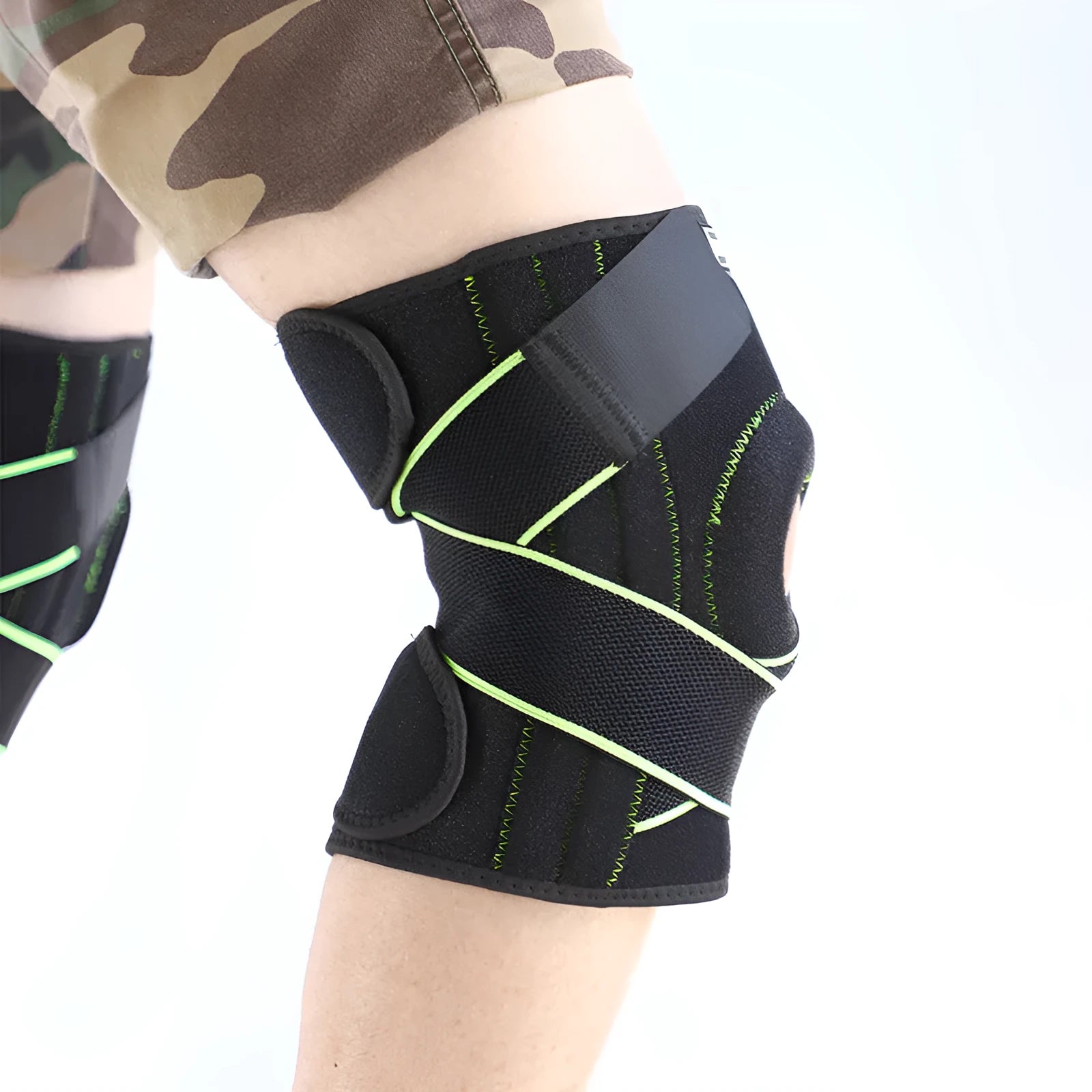 Outdoor sports compression knee pad made of OK cloth and Lycra with metal springs and magic buckle in black
