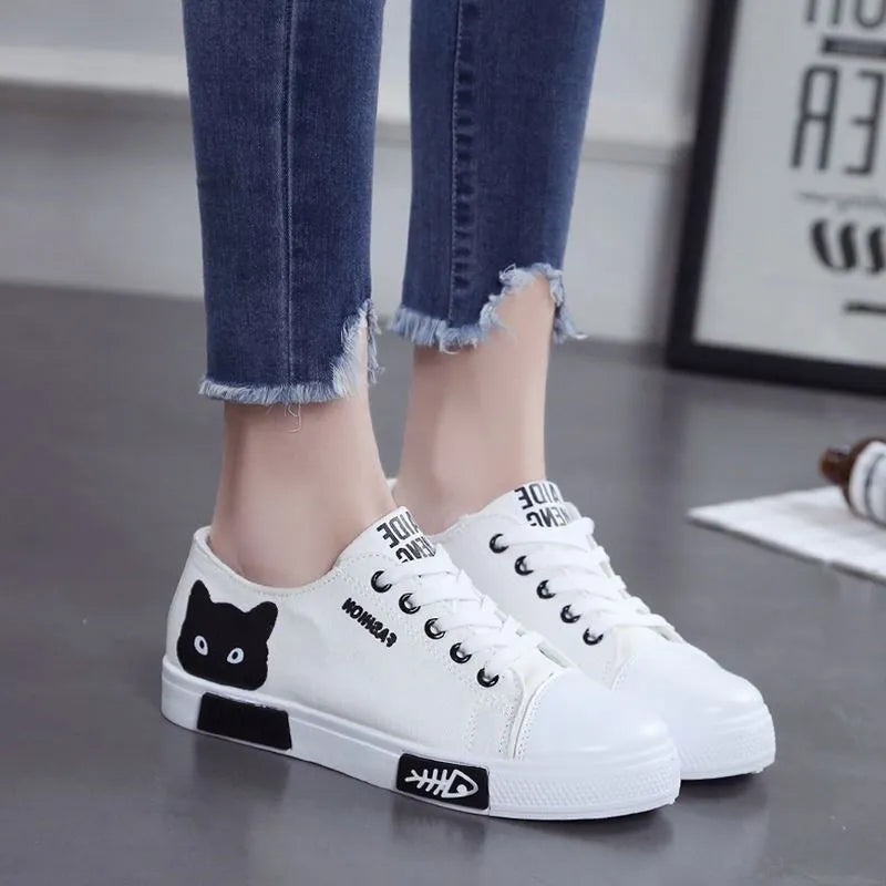 Cat fish canvas shoes with breathable canvas upper and lace-up closure, available in pink, black, and white