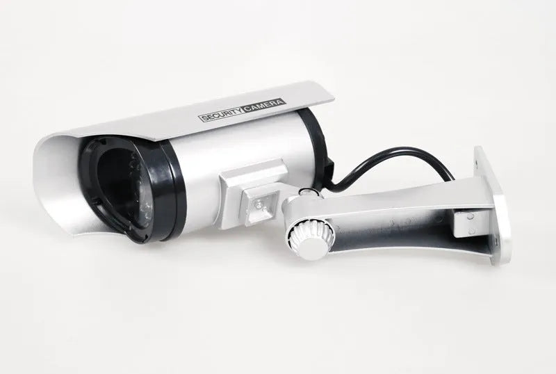 Solar powered fake camera dummy CCTV monitor in black or silver for visible security deterrence