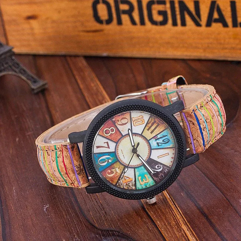 Vintage leather women's quartz watch showing 37mm round dial with tempered glass and stainless steel buckle