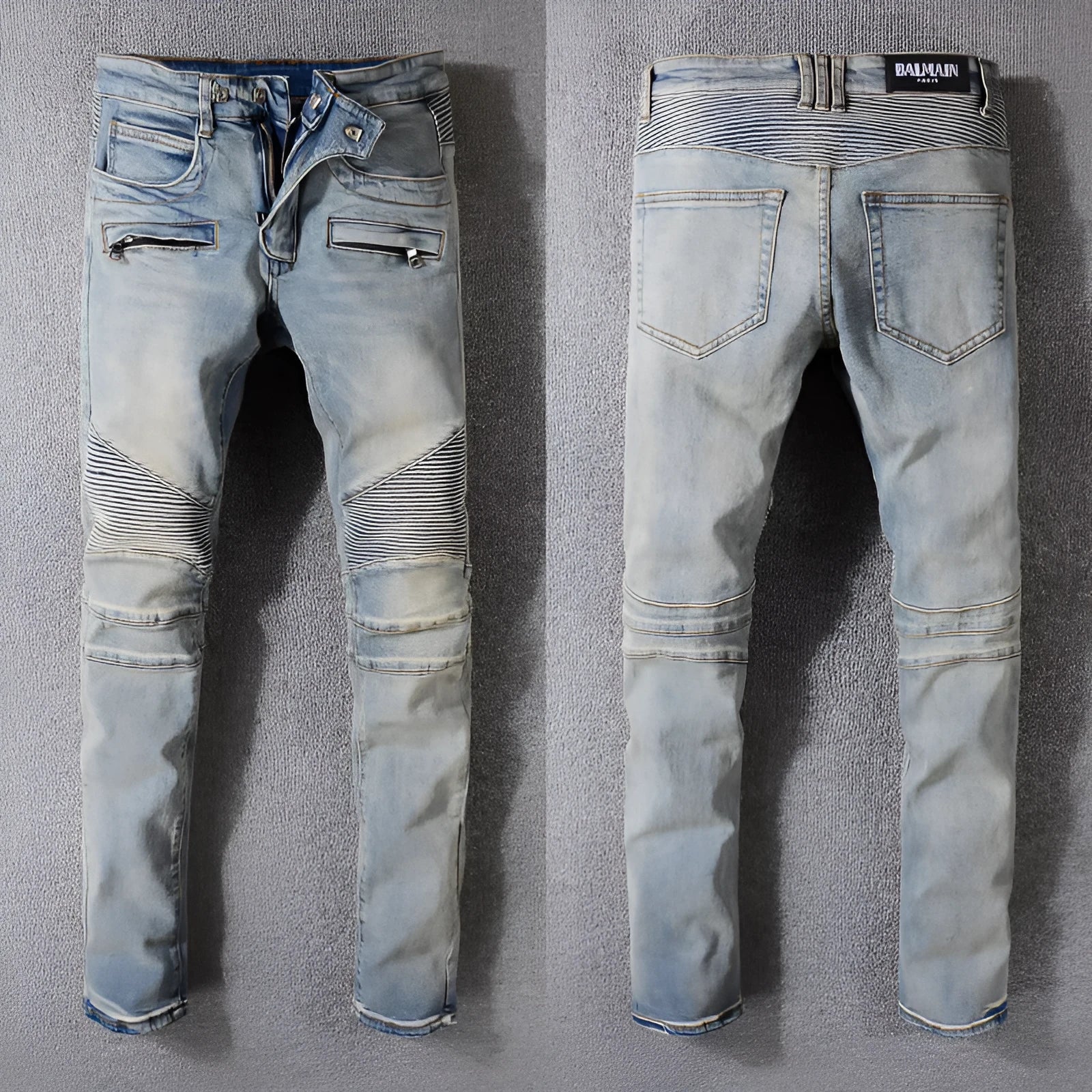 Grey biker jeans with straight tube leg, mid-rise waist, zipper fly, and distressed denim finish