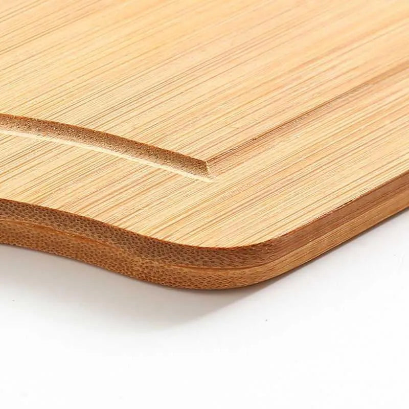 Bamboo fibre multipurpose chopping pizza and fruit board 33x18cm on kitchen counter