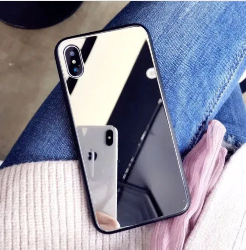 Black iPhone case with a reflective mirror surface on the back, compatible with iPhone 7, 8 Plus, and X models.