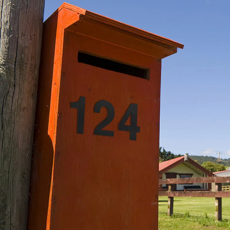 Black stainless steel sticky house numbers showing letters A-F and numbers 0-9, each 7.5cm tall