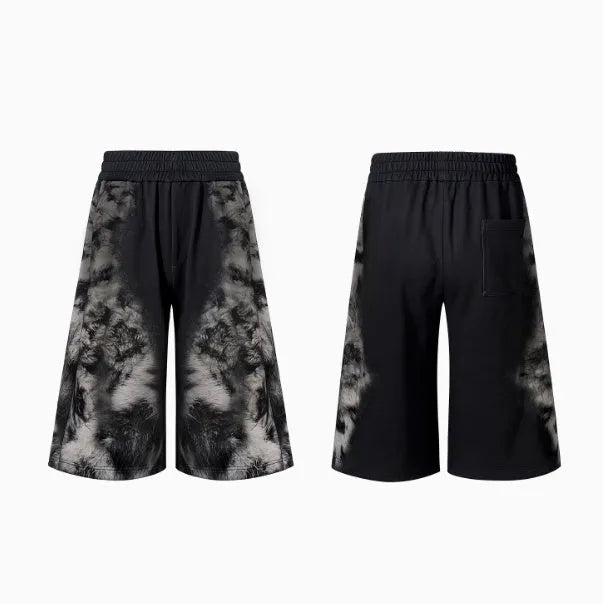 Women's printed loose-fit co-ord set showing hoodie, trousers, and seven-inch shorts together