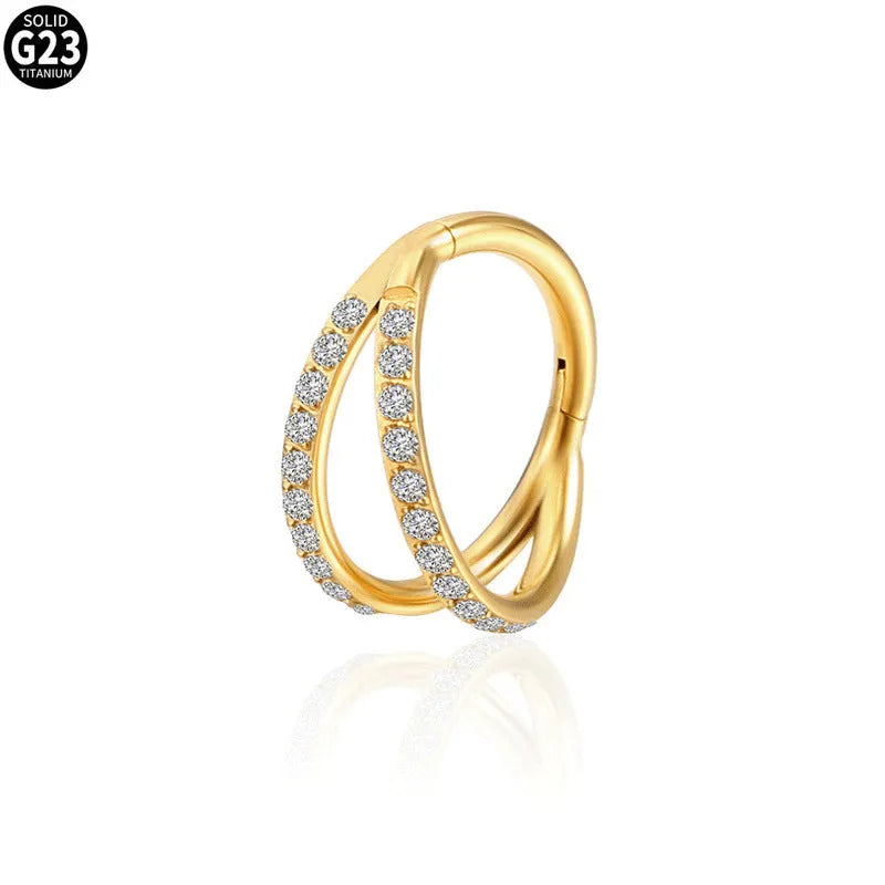 G23 titanium alloy zircon nose ring shown in steel and gold colour on size chart.