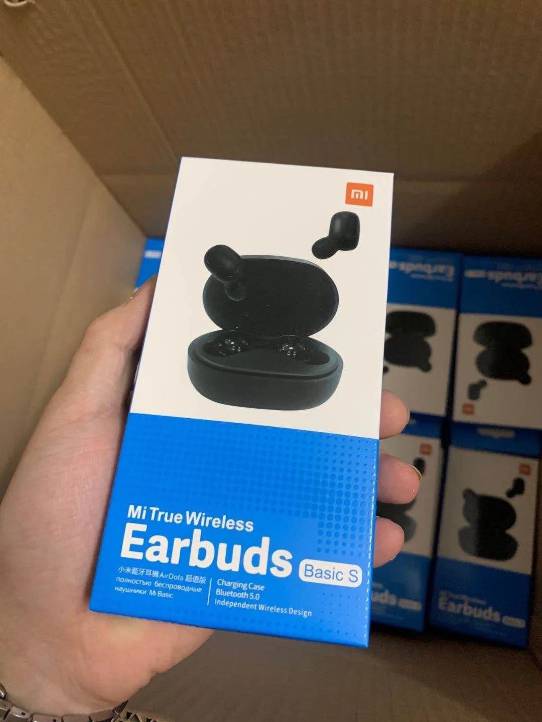 Redmi AirDots 2 black true wireless earbuds and charging case.