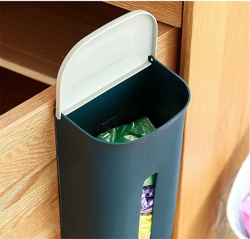 Wall-mounted plastic bag storage box in Nordic green with top flip lid and bottom extraction slot