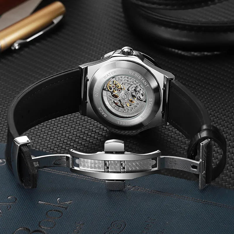 Automatic mechanical men's watch with hollow dial, diamond studs, and a white shell case.