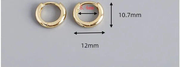 Women's sterling silver round stud earrings in gold and silver finishes