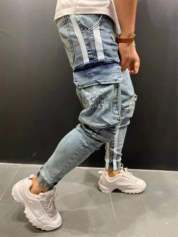 Men's knee-cut denim trousers with zip fly placket, 80% cotton, black or light blue, sizes S to 3XL.