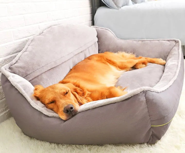 Grey dog bed sofa bed with raised edges and foam padding in XL size