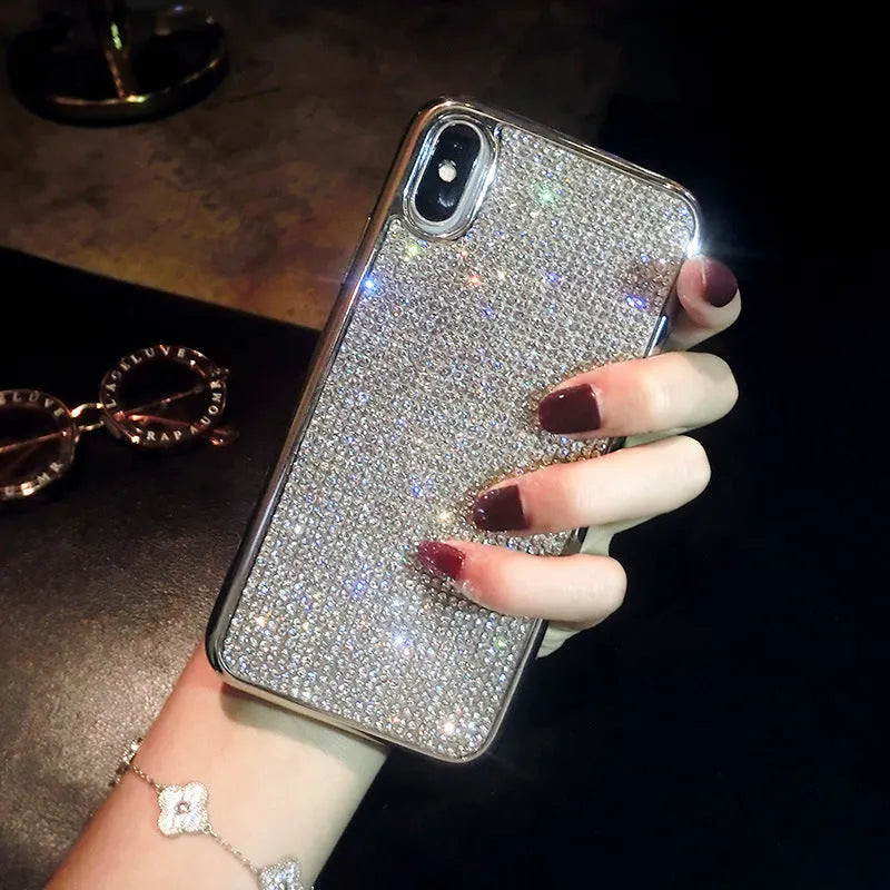 Silver rhinestone decorated silicone phone case for iPhone models showing full diamond pattern