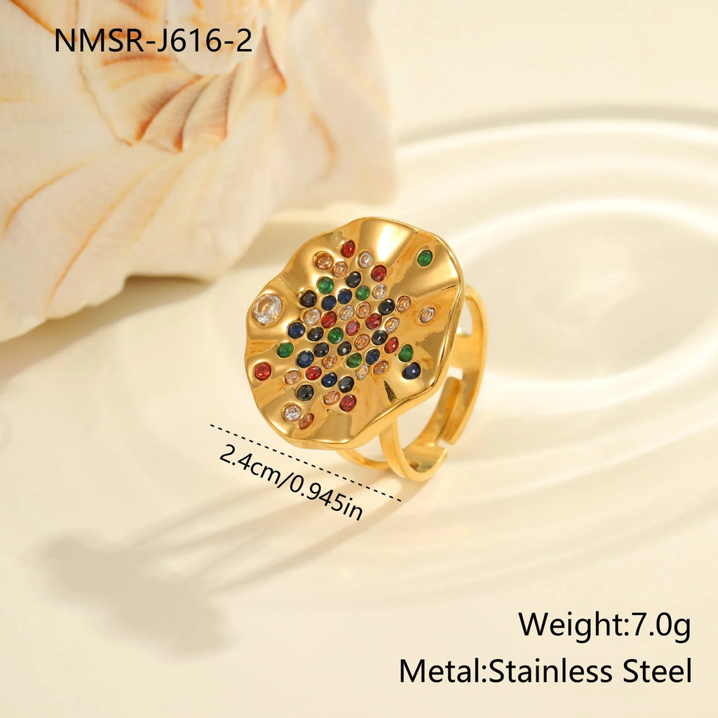 Geometric open mouth ring with pleated inlaid diamond detailing in electroplated stainless steel