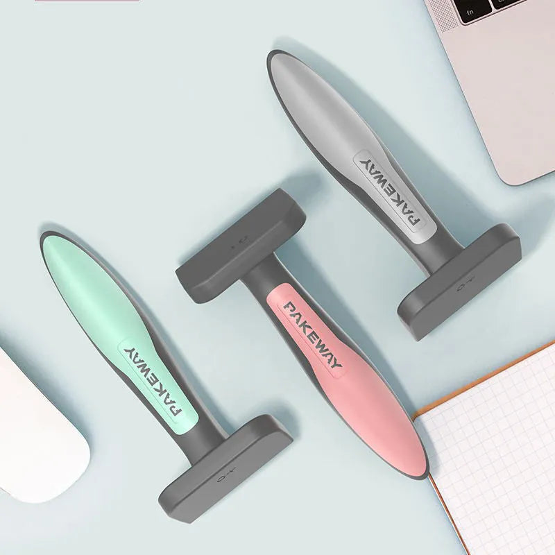 T9 series pet hair removal comb in pink, mint green, and grey on white background