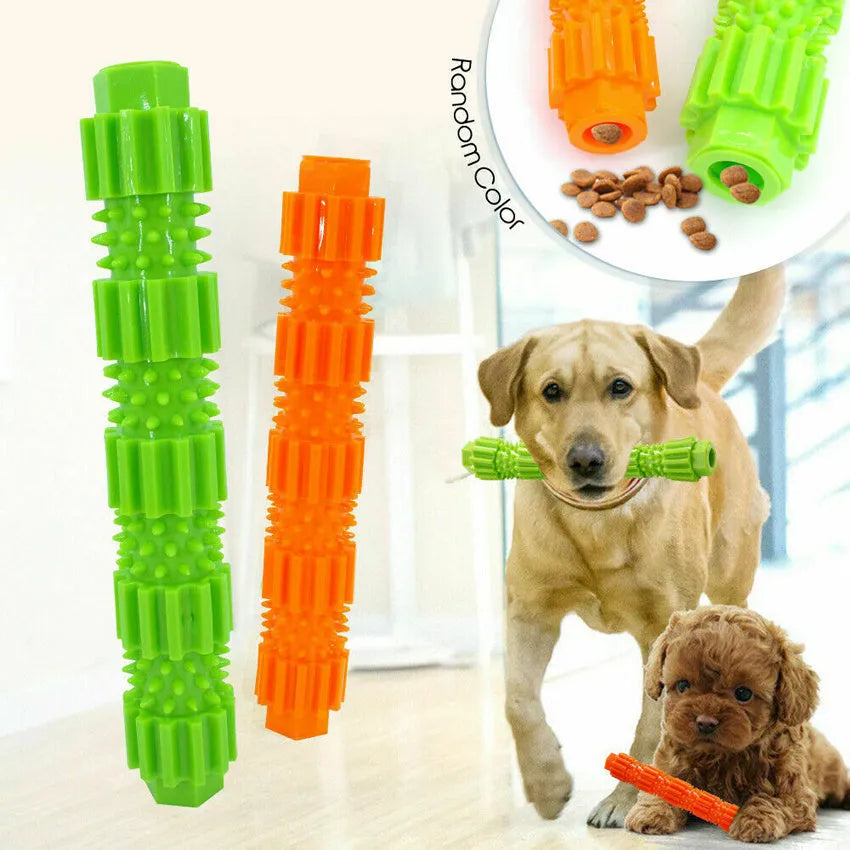 Green and orange rubber dog chew toy with treat dispensing compartment and squeaker for aggressive chewers