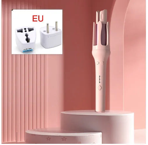 White and pink automatic hair curler with 32mm rotating barrel on a table