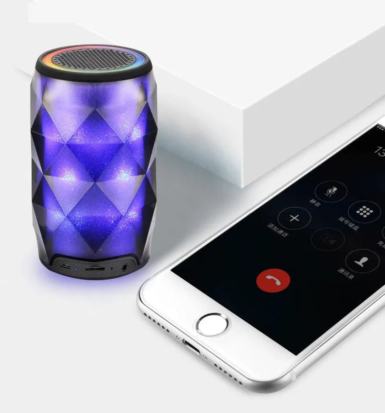 Black crystal-cut Coke can shaped Bluetooth speaker with colourful LED starry sky lighting effects.